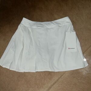 size 4 lulu lemon asymmetrical pleated tennis skirt